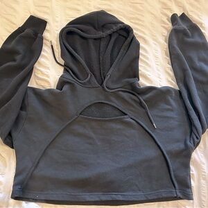 Cropped black hoodie sweatshirt with keyhole opening.